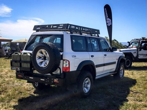 Uneek rear bar with black step and twin swing outs Uneek rear bar with black step and twin swing outs