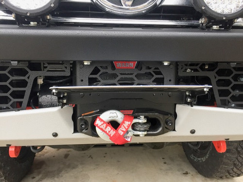 Flip up number plate bracket for winch access