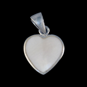 This unique heart shaped mammoth ivory tusk is inlayed into a sterling silver pendant.  This pendant comes with an 18" Sterling Silver chain.  The dimensions of the mammoth pendant tusk is approximately .58" x .50".