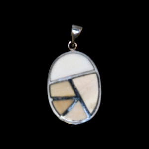 This distinguished medium oval shaped mammoth tusk piece is inlayed into a sterling silver pendant with sterling silver bars.  This pendant comes with an 18" Sterling Silver chain.  The dimensions of the mammoth pendant tusk is approximately .78" x .90".