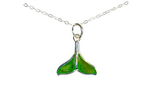 Small Whale Tail Alaskan Jade Sterling Silver Pendant | F&F Inc.

This marvelous small whale tail shaped Alaskan Jade piece is inlayed into a sterling silver pendant.  This pendant comes with an 18" Sterling Silver chain.  The dimensions of the Alaskan Jade pendant is approximately .26" x .42".  The product id # is PJ-1221-S.

Genuine Jade (nephrite) is a fascinating gemstone and the state gem of Alaska. In prehistoric times, prized for its toughness, jade was used to make weapons, tools and later simple ornaments. Jade purportedly can protect you from evil, attract love and of course bring you good luck. It is now regarded as a symbol of energy and beauty. Stimulating creativity and mental agility along with harmony and balance. The jade we use comes from the Nana Region of Alaska.

All pendants come boxed with a Alasan Jade  story card.

Enjoy your unique piece of history!

Features
Alaska Jade
Small Whale Tail Shape
18" Sterling Silver chain
Sterling Silver
Lifetime Guarantee!!