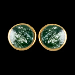 This trendy round Alaskan Jade is inlaid into a beautiful 14K Gold earring.  These unique earrings have a post backing.  The diameter of the round mammoth tusk is approximately .29".