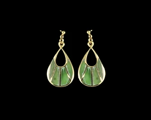 This one of a kind fan shaped Alaskan Jade piece is inlaid into a trendy 14K Gold earring that is accentuated with 14 K Gold bars.  These chic earrings have a post backing.  The measurements of the earrings are approximately .78" x .37".