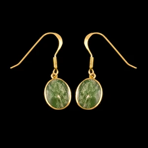 This trendy Oval Shaped Alaskan Jade piece is inlaid into a 14K Gold french wire earring.  The measurements of the earrings are approximately .375 x .380"