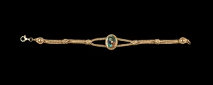 This trendy round Northern Light is inlayed into a breathtaking single stone oval shaped shaped 14K Gold bracelet.    The dimension of the bracelet is approximately 7" x .65".