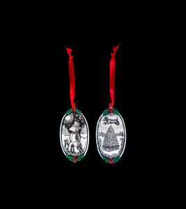Snow Dog  This is a beautiful double sided ornament with a Snow Dog theme.  This is part of the incredible line of Mossup Valley Designs that we carry, with the wonderful artist Rachel Badeau.  The dimensions of the ornament are 3.28" x 1.61".  The SKU is MVD ORN 3.