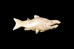 This is a beautiful hand carved eco-ivory Salmon Statue.  The dimensions of the Salmon Statue are 2.59" x 0.99" x .55".  The SKU is C-35.

This unique Salmon Statue statue will make a great addition to any room in the house.  You can place it on any flat surface to diplay, or a great gift for children to have.

All statues are hand carved in clay.  We then make a mold of the original piece before producing them into the final acrylic resin product with an antique finish.