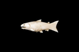 This is a detailed hand carved eco-ivory Salmon Fish Statue  The dimensions of the Salmon Fish Statue are 2.65" x 1.02" x 0.49".  The SKU is C-34.  

This stunning Salmon Fish Statue will make a great addition to any room in the house.  You can place it on any flat surface to display, or a great gift for children to have.