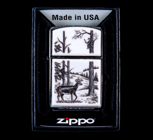 This is a beautiful originally hand etched Eco-Ivory Scrimshaw Deer Designed Zippo!  The top of the flip lighter has a bow hunter in a tree design.  The Zippo is a Brushed Chrome finish. Each lighter has a bottom stamp signifying the year it was made, is refillable. All windproof lighters are American made in Bradford, PA factory and come packaged in a gift box.  This is part of the Save the Elephant Collection and was originally hand etched by Linda Layden.  The SKU is NC 54 - 112.

The Zippo Lighter is 2.24" x 1.51" x 0.59".  It weighs 2.04 oz.