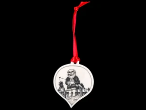 This is a unique teardrop ornament with a Santa Fishing Scene.  This is part of our Save the Elephant Collection that we make, with the wonderful artist Linda Layden.  The dimensions of the ornament are 1.91" x 1.37" x 0.12".  The SKU is NC 50T - 02S

Fishing Santa Ornament.  On this teardrop ornament is beautifully etched Fishing Santa design. With the tropical Santa design on one side, the back has a sanded finish.