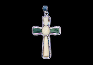 Large Cross Alaskan Mammoth Jade Sterling Silver Pendant Zoom

This striking large cross shaped Alaskan Mammoth Jade piece is inlayed into a Sterling Silver pendant.  This pendant comes with an 18" Sterling Silver chain.  The dimensions of the Alaskan Mammoth Jade pendant is approximately 1.23" x .79".  The product id # is PMJ-1079-S

The pre-historic Mammoth tusks are found as a bi - product of the gold mining industry in Alaska. They are carbon dated to be approximately 25,800 years old.  The color of your mammoth tusk may vary due to the minerals in the ground water where the tusks are buried.  The varying color of the mammoth tusks make each piece of jewelry unique. Cracks and splits in the ivory occur naturally due to it’s great age.  Our materials are considered eco-friendly because no animals were harmed in the making of this beautiful piece of jewelry. 

Genuine Jade (nephrite) is a fascinating gemstone and the state gem of Alaska. In prehistoric times, prized for its toughness, jade was used to make weapons, tools and later simple ornaments. Jade purportedly can protect you from evil, attract love and of course bring you good luck. It is now regarded as a symbol of energy and beauty. Stimulating creativity and mental agility along with harmony and balance. The jade we use comes from the Nana Region of Alaska.