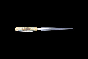 LO 409C Front.  This unique hand etched Octopus and Ship Colored design on a bovine bone Letter Opener with a foldable knife.  The stunning design has a giant Octopus attacking a tall ship at sea.  This beautiful letter opener is part of the Scrimshaw Collection, with those words laser engraved into the blade.  The Letter Opener has a stainless steel knife.  The dimensions of the Letter Opener with the blade closed are 7.75" x 0.63" x 0.42".  The blade itself is approximately 2.16" making the width of the knife with an open blade 9.77".  The SKU is LO 409C.

The scrimshaw is inked with colored india ink and sealed with renaissance wax, which is used by museums for antique restoration.  It also helps bring out the beauty of the artwork as well as in the cow bone. The knife is water resistant, but not waterproof.