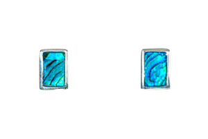 This beautiful rectangle Paua Shell is inlayed into a Sterling Silver earring.  These unique earrings have a post backing.  The diameter of the round Paua Shell is approximately .27" x .38".  The product id # is ENL-1214-S.

This is our line of PĀUA Shell Jewelry.  In New Zealand, abalone is called pāua or blackfoot pāua is the ubiquitous New Zealand pāua the highly polished nacre of which is extremely popular as souvenirs with its striking blue, green, and purple iridescence that allows for the stunning jewelry.

Enjoy your unique set of earrings!!

Features:
Northern Lights
Paua Shell
Round Shaped 
Sterling Silver
Lifetime Guarantee!!