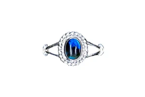 Oval with Rope Border Shaped Northern Lights Sterling Silver Ring | F&F Inc.

This gorgeous Oval with Rope Border shaped Northern Lights is inlayed into a elegant sterling silver ring.  The dimension of the stone on the ring is approximately .366" x .216".  The product id # is RNL-1017-S.         

This ring comes in the following sizes for the sterling silver ring band.  Size 5, 6, 7, 8, 9 and 10     

This is our line of PĀUA Shell Jewelry.  In New Zealand, abalone is called pāua or blackfoot pāua is the ubiquitous New Zealand pāua the highly polished nacre of which is extremely popular as souvenirs with its striking blue, green, and purple iridescence that allows for the stunning jewelry.

Enjoy your unique piece of history!

Features
Northern Lights
Paua Shell
Sterling Silver Ring
Oval with Rope Border Shaped 
Lifetime Guarantee!!