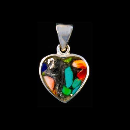 This unique heart shaped Northern Lights Stone is inlayed into a Sterling Silver pendant.  This pendant comes with an 18" Sterling Silver chain.  The dimensions of the Northern Lights Stone is approximately .58" x .50".