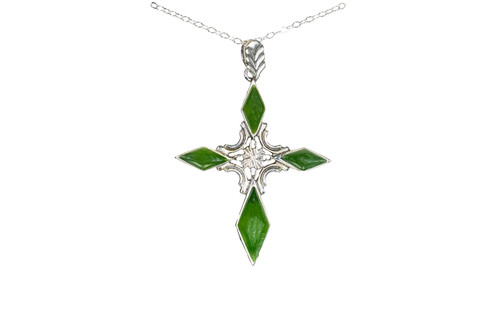 Unique Cross Alaskan Jade Sterling Silver Pendant | F&F Inc. | F&F Inc.

This is a unique cross pendant with Alaskan Jade.  The measurements of the pendant are approximately 1.2" x 1.5".  The product ID is EJ-1109-S.

Genuine Jade (nephrite) is a fascinating gemstone and the state gem of Alaska. In prehistoric times, prized for its toughness, jade was used to make weapons, tools and later simple ornaments. Jade purportedly can protect you from evil, attract love and of course bring you good luck. It is now regarded as a symbol of energy and beauty. Stimulating creativity and mental agility along with harmony and balance. The jade we use comes from the Nana Region of Alaska.

Enjoy your unique piece of history!

Features:
Alaskan Jade
Unique Cross Design
Sterling Silver
Lifetime Guarantee!!