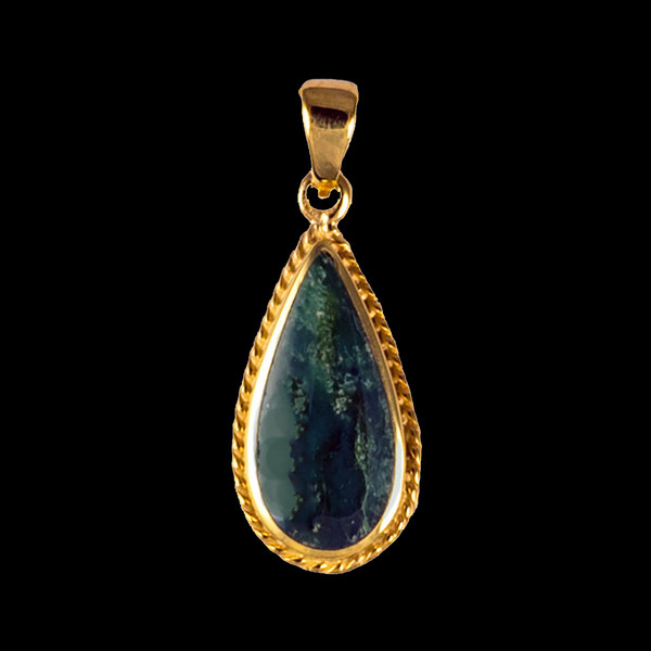 This elegant teardrop shaped Alaskan Jade piece is inlayed into a 14K Gold pendant with a rope border.  This pendant comes with an 18" 14K Gold chain.  The dimensions of the Alaskan Jade pendant is approximately 1.23" x .79".