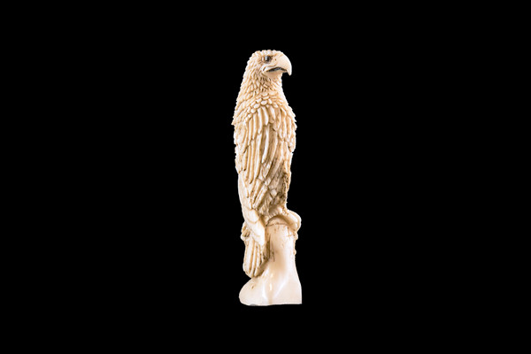 This is a beautiful hand carved eco-ivory Eagle Statue.  The dimensions of the Eagle Statue are 0.75" x 2.38" x .52".  The SKU is C-37.

This unique Eagle Statue statue will make a great addition to any room in the house.  You can place it on any flat surface to diplay, or a great gift for children to have.

All statues are hand carved in clay.  We then make a mold of the original piece before producing them into the final acrylic resin product with an antique finish.