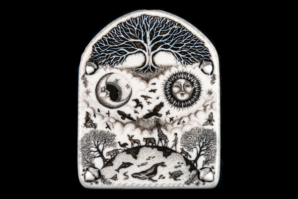 This is a gorgeous wall plaque was originally hand etched Small Tree of Life Wall Plaque design.  This is part of the incredible line of Mossup Valley Designs that we carry, with the wonderful artist Rachel Badeau.  The dimensions of the plaque are 3.38" x 4.36" x 0.32".  The SKU is MVD WP 4.

Rachel Badeau has been etching and engraving in a variety of media for over thirty years.  Her work, characterized by fine line and intricate detail, attempts to touch the hearts and emotions of others.  All while reflecting her love of animals, nature and the human spirit.  

The resin scrimshaw piece is originally hand etched by Rachel Badeau.  We make a mold of the original piece and do an open cast pour of our resin mixture.  The pieces are removed from the mold and sanded and inked.