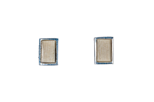 Classic Rectangle Alaskan Mammoth Sterling Silver French Wire Earring| F&F Inc.
This beautiful Rectangle shaped Alaskan Mammoth piece is inlayed into a Sterling Silver french wire earring.  The measurements of the earrings are approximately .38" x .27".  The product ID is EM-1000-S.
The pre-historic Mammoth tusks are found as a bi - product of the gold mining industry in Alaska. They are carbon dated to be approximately 25,800 years old.  The color of your mammoth tusk may vary due to the minerals in the ground water where the tusks are buried.  The varying color of the mammoth tusks make each piece of jewelry unique. Cracks and splits in the ivory occur naturally due to it’s great age.  Our materials are considered eco-friendly because no animals were harmed in the making of this beautiful piece of jewelry. 
Enjoy your unique piece of history!
Due to State law, the sale of antique Mammoth Ivory is not allowed to be sold in the following states. California, Hawaii, Nevada, New Jersey, New York, and Oregon.  If the product is to be shipped to these states, the order will be cancelled and you will be notified!
Features
Alaskan Mammoth
Classic Rectangle Design
French Wire
Sterling Silver
Lifetime Guarantee!! Classic Rectangle Alaskan Mammoth Sterling Silver French Wire Earring| F&F Inc.
This beautiful Rectangle shaped Alaskan Mammoth piece is inlayed into a Sterling Silver french wire earring.  The measurements of the earrings are approximately .38" x .27".  The product ID is EM-1000-S.
The pre-historic Mammoth tusks are found as a bi - product of the gold mining industry in Alaska. They are carbon dated to be approximately 25,800 years old.  The color of your mammoth tusk may vary due to the minerals in the ground water where the tusks are buried.  The varying color of the mammoth tusks make each piece of jewelry unique. Cracks and splits in the ivory occur naturally due to it’s great age.  Our materials are considered eco-friendly because no animals were harmed in the making of this beautiful piece of jewelry. 
Enjoy your unique piece of history!
Due to State law, the sale of antique Mammoth Ivory is not allowed to be sold in the following states. California, Hawaii, Nevada, New Jersey, New York, and Oregon.  If the product is to be shipped to these states, the order will be cancelled and you will be notified!
Features
Alaskan Mammoth
Classic Rectangle Design
French Wire
Sterling Silver
Lifetime Guarantee!!