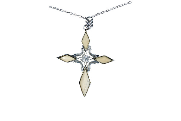 Unique Cross Alaskan Mammoth Sterling Silver Pendant | F&F Inc.
This is a unique cross pendant with Alaskan Mammoth.  The measurements of the pendant are approximately 1.2" x 1.5".  The product ID is EJ-1109-S.
The pre-historic Mammoth tusks are found as a bi - product of the gold mining industry in Alaska. They are carbon dated to be approximately 25,800 years old.  The color of your mammoth tusk may vary due to the minerals in the ground water where the tusks are buried.  The varying color of the mammoth tusks make each piece of jewelry unique. Cracks and splits in the ivory occur naturally due to it’s great age.  Our materials are considered eco-friendly because no animals were harmed in the making of this beautiful piece of jewelry. 
All pendants come boxed with a Mammoth Ivory story card.
Enjoy your unique piece of history!
Due to State law, the sale of antique Mammoth Ivory is not allowed to be sold in the following states. California, Hawaii, Nevada, New Jersey, New York, and Oregon.  If the product is to be shipped to these states, the order will be cancelled and you will be notified!
Features:
Alaskan Mammoth
Unique Cross Design
Sterling Silver
Lifetime Guarantee!! Unique Cross Alaskan Mammoth Sterling Silver Pendant | F&F Inc.
This is a unique cross pendant with Alaskan Mammoth.  The measurements of the pendant are approximately 1.2" x 1.5".  The product ID is EJ-1109-S.
The pre-historic Mammoth tusks are found as a bi - product of the gold mining industry in Alaska. They are carbon dated to be approximately 25,800 years old.  The color of your mammoth tusk may vary due to the minerals in the ground water where the tusks are buried.  The varying color of the mammoth tusks make each piece of jewelry unique. Cracks and splits in the ivory occur naturally due to it’s great age.  Our materials are considered eco-friendly because no animals were harmed in the making of this beautiful piece of jewelry. 
All pendants come boxed with a Mammoth Ivory story card.
Enjoy your unique piece of history!
Due to State law, the sale of antique Mammoth Ivory is not allowed to be sold in the following states. California, Hawaii, Nevada, New Jersey, New York, and Oregon.  If the product is to be shipped to these states, the order will be cancelled and you will be notified!
Features:
Alaskan Mammoth
Unique Cross Design
Sterling Silver
Lifetime Guarantee!!