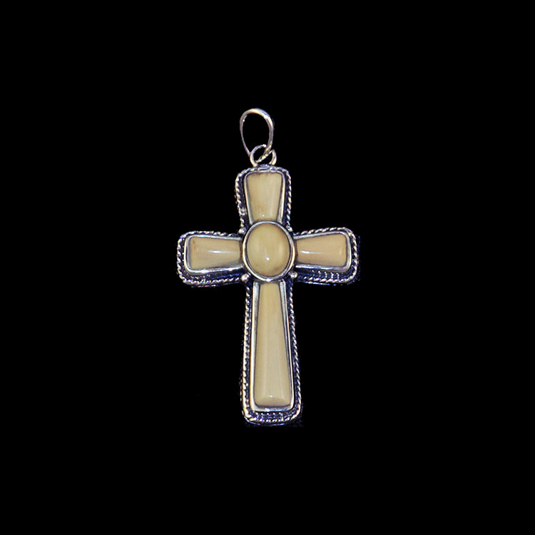 This striking large cross shaped mammoth tusk piece is inlayed into a sterling silver pendant.  This pendant comes with an 18" Sterling Silver chain.  The dimensions of the mammoth pendant tusk is approximately 1.23" x .79".