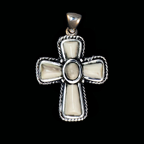 This graceful small cross shaped mammoth tusk piece is inlayed into a sterling silver pendant.  This pendant comes with an 18" Sterling Silver chain.  The dimensions of the mammoth pendant tusk is approximately .87" x .63".