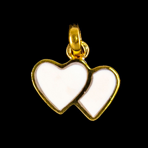 This elegant small double heart shaped mammoth ivory tusk is inlayed into a 14K Gold pendant.  This pendant comes with an 18" 14K Gold chain.  The dimensions of the mammoth pendant tusk is approximately .41" x .63".