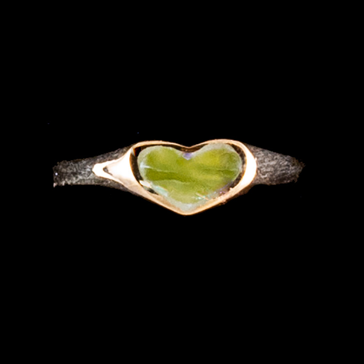 Heart Shaped Alaskan Jade 14K Gold Ring | F&F Inc.This gorgeous heart shaped Alaskan Jade is inlayed into a elegant 14K Gold ring.  The dimension of the stone on the ring is approximately .366" x .216".  The product id # is RJ-1003-G   It is a 14K plate on sterling silver. The plating is with 30mils of 14k gold. Typically plating is done with 3mils of gold. We work with the extra gold plating to ensure your beautiful jewelry piece will have a strong gold color for years to come!! This ring comes in the following sizes for the 14K Gold ring band.  Size 5, 6, 7, 8, 9 and 10.