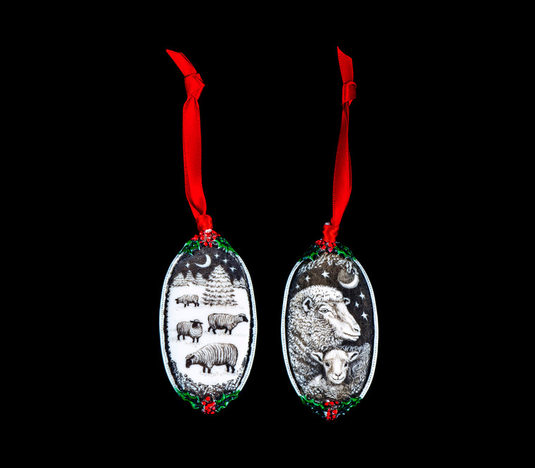 Sheep Face This is a beautiful double sided ornament with a Sheep theme.  This is part of the incredible line of Mossup Valley Designs that we carry, with the wonderful artist Rachel Badeau.  The dimensions of the ornament are 3.28" x 1.61".  The SKU is MVD ORN 11.