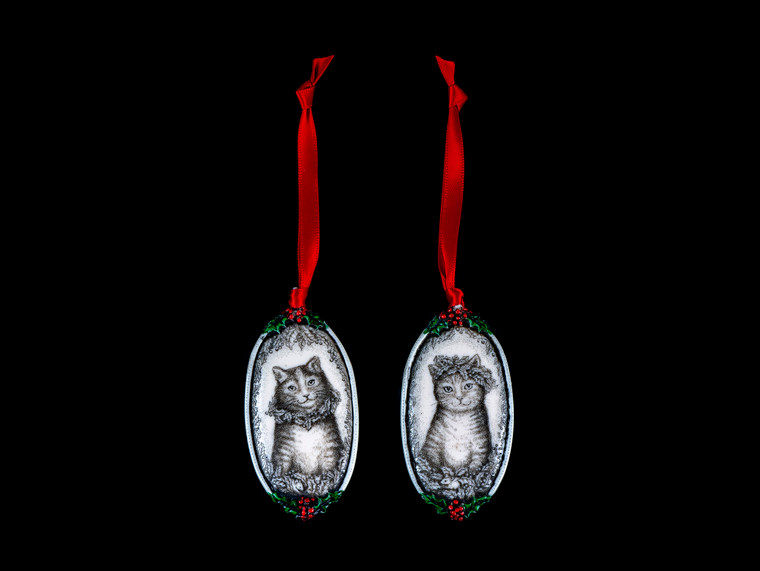 Cat with Crown This is a beautiful double sided ornament with a Cat theme.  This is part of the incredible line of Mossup Valley Designs that we carry, with the wonderful artist Rachel Badeau.  The dimensions of the ornament are 3.28" x 1.61".  The SKU is MVD ORN 11.