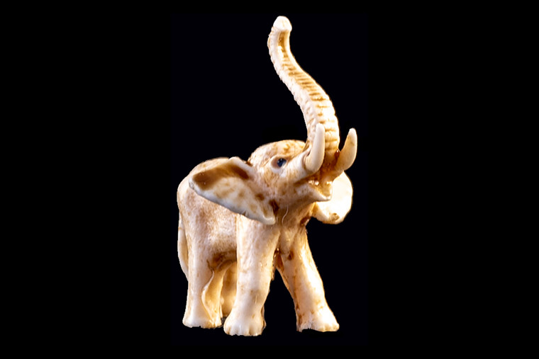 This is a detailed hand carved eco-ivory Elephant Ears Up Statue.  The dimensions of the Elephant Ears Up Statue  are 0.86" x 1.47" x 1.45".  The SKU is C-4.

This beautiful Elephant Ears Up Statue statue will make a great addition to any room in the house.  You can place it on any flat surface to display, or a great gift for children to have.

All statues are hand carved in clay.  We then make a mold of the original piece before producing them into the final acrylic resin product with an antique finish.
