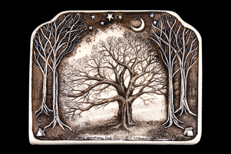 This is a gorgeous wall plaque was originally hand etched Small Grandfather Oak Wall Plaque design.  This is part of the incredible line of Mossup Valley Designs that we carry, with the wonderful artist Rachel Badeau.  The dimensions of the plaque are 5.37" x 4.25" x 0.31".  The SKU is MVD WP 7.

Rachel Badeau has been etching and engraving in a variety of media for over thirty years.  Her work, characterized by fine line and intricate detail, attempts to touch the hearts and emotions of others.  All while reflecting her love of animals, nature and the human spirit.  

The resin scrimshaw piece is originally hand etched by Rachel Badeau.  We make a mold of the original piece and do an open cast pour of our resin mixture.  The pieces are removed from the mold and sanded and inked.