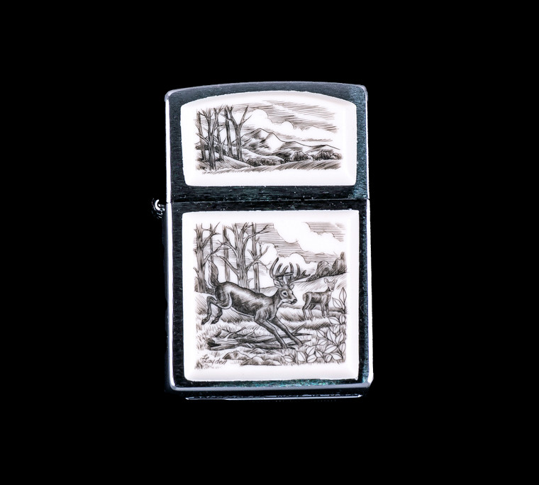 This is a stunning originally hand etched Eco-Ivory Scrimshaw Jumping Deer Designed Zippo! The top of the flip lighter has a a Mountain Range with Tree's design.  The Zippo is a Brushed Chrome finish. Each lighter has a bottom stamp signifying the year it was made, is refillable. All windproof lighters are American made in Bradford, PA factory and come packaged in a gift box.  This is part of the Save the Elephant Collection and was originally hand etched by Linda Layden.  The SKU is NC 54 - 110.

The Zippo Lighter is 2.24" x 1.51" x 0.59".  It weighs 2.04 oz.