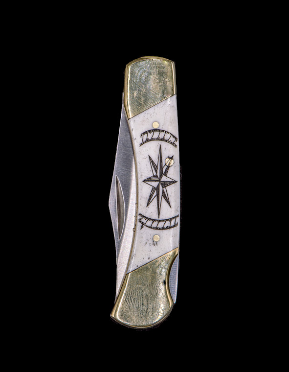 LB 3 Compass Rose Medium Pocket Knife.  This sharp hand etched Compass Rose design on a 440 Stainless Steel Blade LB 3 Knife. This beautiful knife is part of the Scrimshaw Collection, with those words laser engraved into the blade.  The LB 3 knifes come with the pictured leather sheath and each scale is made with Bovine Bone.  The LB 3 Knife has bolsters and shackle that are nickel silver with brass pins and liner.  It is a lock blade knife and a very useful pocket knife. The dimensions of the LB 3 Pocket Knife with the blade closed are 2.97" x 0.76" x 0.31".  The blade itself is approximately 2.21" making the width of the knife with an open blade 5.18".  The SKU is LB-3 149.