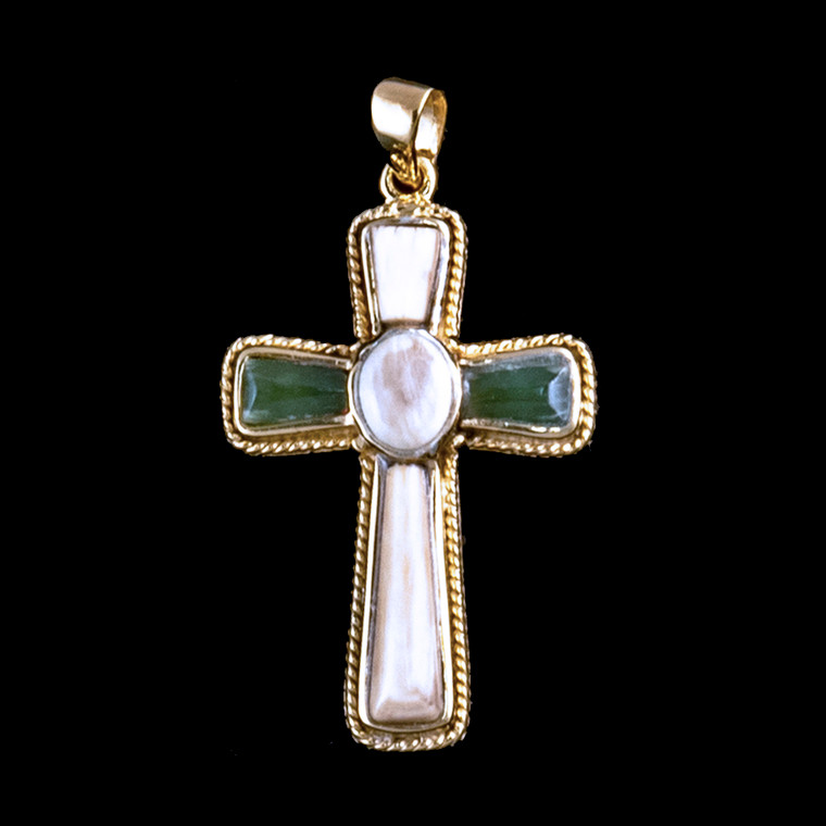 Large Cross Alaskan Mammoth Jade 14K Gold Pendant

This striking large cross shaped Alaskan Mammoth Jade piece is inlayed into a 14K Gold pendant.  This pendant comes with an 18" 14K Gold chain.  The dimensions of the Alaskan Mammoth Jade pendant is approximately 1.23" x .79".  The product id # is PMJ-1079-G

It is a 14K plate on sterling silver. The plating is with 30mils of 14k gold. Typically plating is done with 3mils of gold. We work with the extra gold plating to ensure your beautiful jewelry piece will have a strong gold color for years to come!!  

The pre-historic Mammoth tusks are found as a bi - product of the gold mining industry in Alaska. They are carbon dated to be approximately 25,800 years old.  The color of your mammoth tusk may vary due to the minerals in the ground water where the tusks are buried.  The varying color of the mammoth tusks make each piece of jewelry unique. Cracks and splits in the ivory occur naturally due to it’s great age.  Our materials are considered eco-friendly because no animals were harmed in the making of this beautiful piece of jewelry. 

Genuine Jade (nephrite) is a fascinating gemstone and the state gem of Alaska. In prehistoric times, prized for its toughness, jade was used to make weapons, tools and later simple ornaments. Jade purportedly can protect you from evil, attract love and of course bring you good luck. It is now regarded as a symbol of energy and beauty. Stimulating creativity and mental agility along with harmony and balance. The jade we use comes from the Nana Region of Alaska.