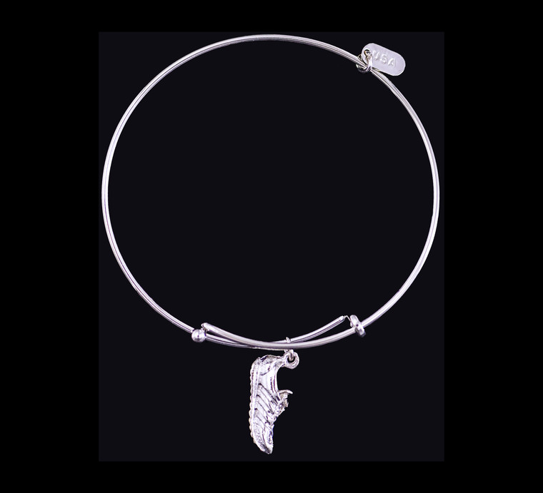 The beautiful adjustable bracelet is decorated with a Running Shoes charm.  The product ID is NC 07-900-S.

This bracelet is a one size for most, with an adjustable wire band.  Each bracelet can be customized with different unique charms to attach.  All parts are made in the USA!.

The silver bracelets are steel with rhodium plating.  They are e-coated to help prevent tarnishing.

The Running Shoe charm is a lead free casted pewter.