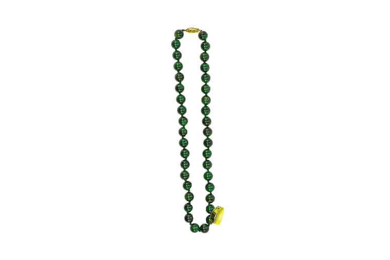 10MM 18" Jade Bead Necklace | F&F Inc.

This stunning 10mm 18" Genuine Jade Beaded Necklace The measurements of the beads 10mm.  The product ID is 10mm18inJ

This necklace has the Jade threaded on a durable silk strand, and between each bead it is knotted to prevent movement of the beads.  The clasp is gold in color.  

Genuine Jade (nephrite) is a fascinating gemstone. In prehistoric times, prized for its toughness, jade was used to make weapons, tools and later simple ornaments. Jade purportedly can protect you from evil, attract love and of course bring you good luck. It is now regarded as a symbol of energy and beauty. Stimulating creativity and mental agility along with harmony and balance. 

Colors of the Jade will vary.

Enjoy your  beautiful piece of jewelry!

Features
10MM Jade Beads
18" Necklace 
Knotted between each bead
Lifetime Guarantee!!