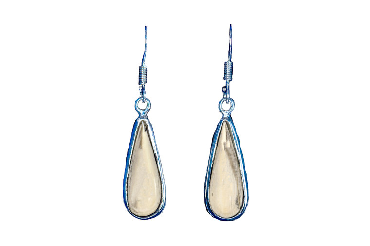 Classic Teardrop Oval Mammoth Sterling Silver Design French Wire Earring | F&F 

This stunning Round Teardrop Alaskan Mammoth Ivory is inlaid into a beautiful sterling silver french wire earring.  These unique earrings are french wire closure.  The diameter of the earring is approximately .85" x .35".  The product id # is EM-1228-S.

The pre-historic Mammoth tusks are found as a bi - product of the gold mining industry in Alaska. They are carbon dated to be approximately 25,800 years old.  The color of your mammoth tusk may vary due to the minerals in the ground water where the tusks are buried.  The varying color of the mammoth tusks make each piece of jewelry unique. Cracks and splits in the ivory occur naturally due to it’s great age.  Our materials are considered eco-friendly because no animals were harmed in the making of this beautiful piece of jewelry. 

Enjoy your unique piece of history!

Due to State law, the sale of antique Mammoth Ivory is not allowed to be sold in the following states. California, Hawaii, Nevada, New Jersey, New York, and Oregon.  If the product is to be shipped to these states, the order will be cancelled and you will be notified!

Features
Antique Mammoth Tusk
Sterling Silver
French Wire
Custom Artwork is available
Lifetime Guarantee!!