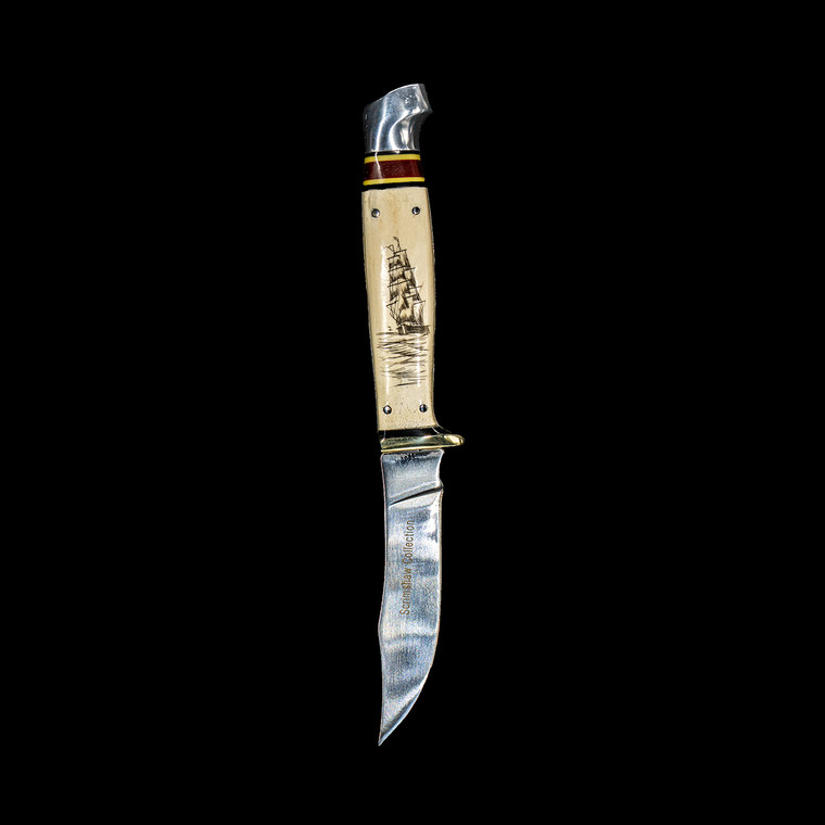 This stunning vertically etched Tall Ship design is done on Shed Moose Antler handle with a Scrimshaw Collection straight blade.  This Bowie like knife, comes with the pictured leather sheath.

The weight of the knife is 5 ounces and the dimensions the knife is 7.6" x .92" x 0.88".  The blade itself is approximately 3.5".  The SKU is SBA 401V. 

The artwork was originally hand etched by Bill Feeney. He received a Bachelor of Arts degree in Mathematics from Saint Francis College in Bidderford, Maine, In 1973 I accepted a teaching position at Westport High School where I met Robert Rayno, the art teacher. As part of the class curriculum, he taught a section on scrimshaw. I sat in on many of his classes and purchased the necessary tools and ivory to begin etching. Combining my natural artistic ability with the techniques learned from Mr. Rayno, the cornerstone of "Spouting Whale" was established.

During the winter season, moose shed their antlers before regrowing them in the spring. The shedding process, also known as casting, is a normal event that occurs annually for many male cervids—a group of hoofed mammals like moose, deer and elk.




Features:
Scrimshaw
Nautical Design
Tall Ship
Shed Antler Handle
Leather Sheath
Straight Blade Knife

Bowie Style Knife
Stainless Steel Blade