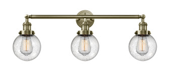 Franklin Restoration Three Light Bath Vanity in Antique Brass (405|205-AB-G204-6)