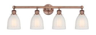 Edison Four Light Bath Vanity in Antique Copper (405|616-4W-AC-G441)