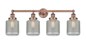 Edison Four Light Bath Vanity in Antique Copper (405|616-4W-AC-G262)