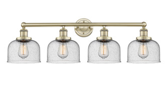 Edison Four Light Bath Vanity in Antique Brass (405|616-4W-AB-G74)