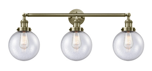 Franklin Restoration Three Light Bath Vanity in Antique Brass (405|205-AB-G204-8)