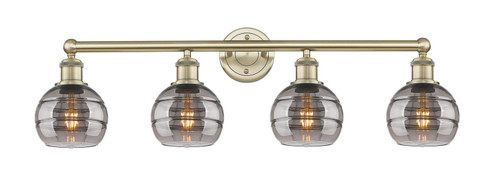 Edison Four Light Bath Vanity in Antique Brass (405|616-4W-AB-G556-6SM)