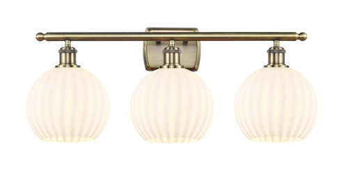 Ballston Three Light Bath Vanity in Antique Brass (405|516-3W-AB-G1217-8WV)