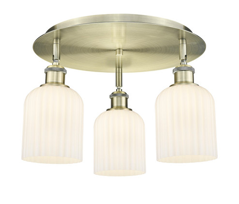 Downtown Urban Three Light Flush Mount in Antique Brass (405|516-3C-AB-G559-5GWH)
