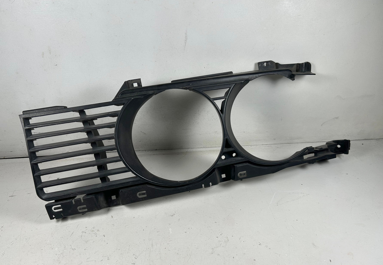 1989-93 BMW E34 540i 535i DRIVER TWIN HEADLIGHT TRIM OEM