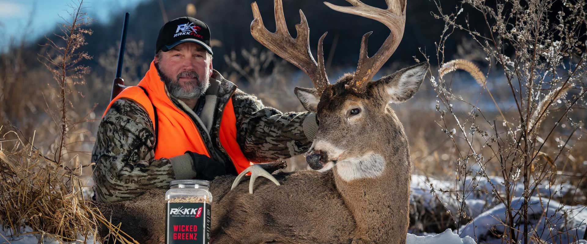 guy holding a buck